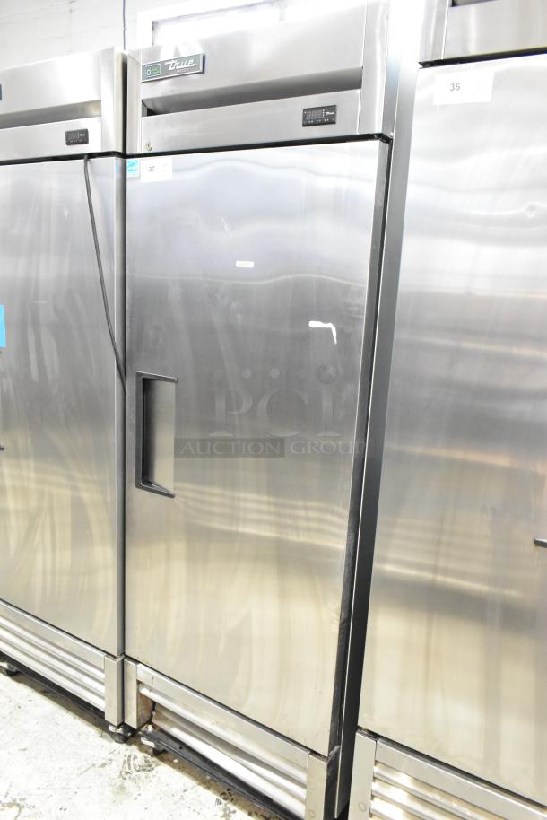 2020 True T-19F-HC stainless steel commercial freezer with poly-coated racks, single door, on casters, 115V, 1 phase.