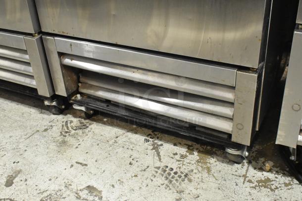 2020 True T-19F-HC stainless steel commercial freezer with poly-coated racks on casters, 115V, single door, visible wear.