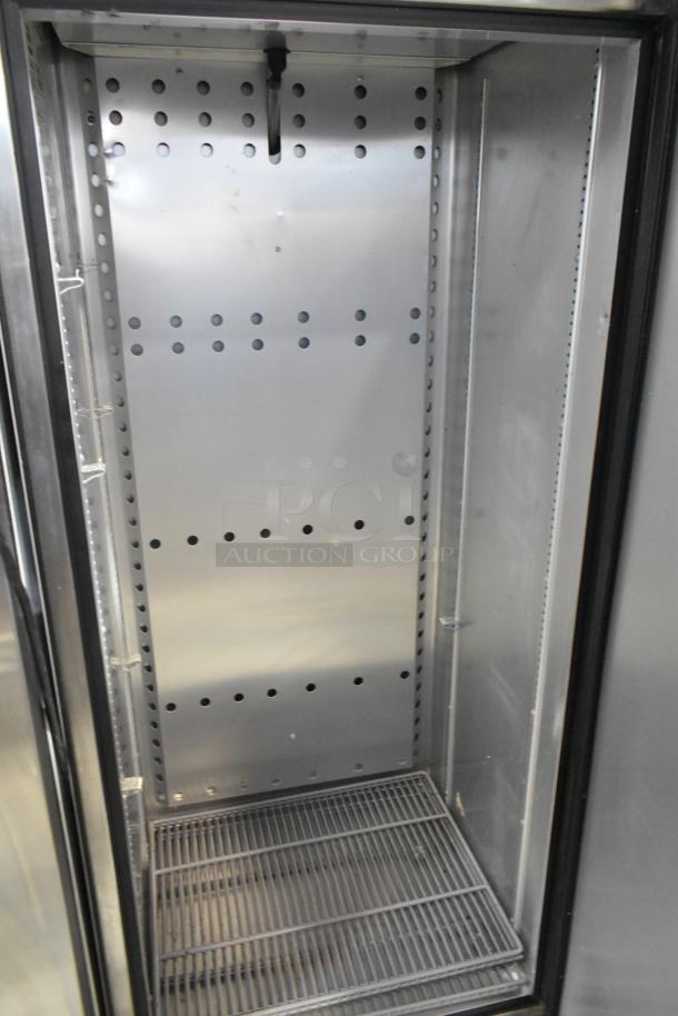 2020 True T-19F-HC stainless steel reach-in freezer; features poly-coated racks, commercial casters, and 1-phase 115V power.