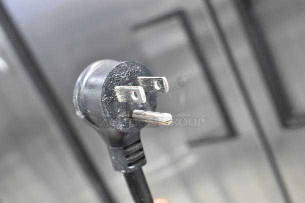 2020 True T-19F-HC stainless steel commercial freezer plug detail, showing 115V, single-phase compatibility.