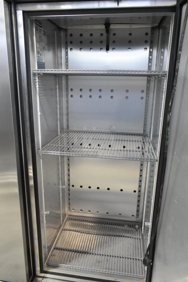 2020 True T-19F-HC single door stainless steel freezer with poly coated racks, on commercial casters, 115V, 1 phase.