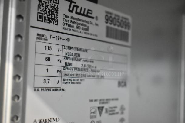 2020 True T-19F-HC freezer label showing model, voltage, phase, and refrigerant details; pristine condition.