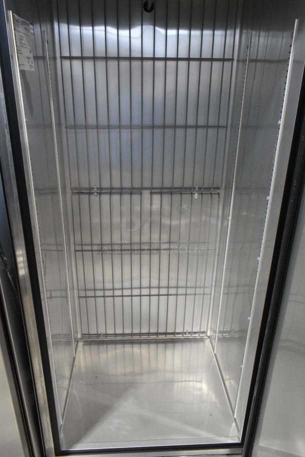 True T-19F stainless steel commercial freezer, single door, on casters, 115V, 1 phase, interior view, excellent condition.