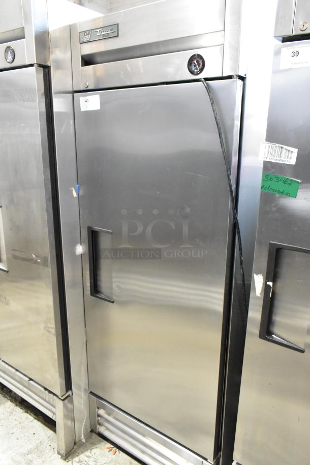 2016 True T-19F stainless steel reach-in freezer, single door, poly coated racks, commercial casters, 115V, 1 Phase.