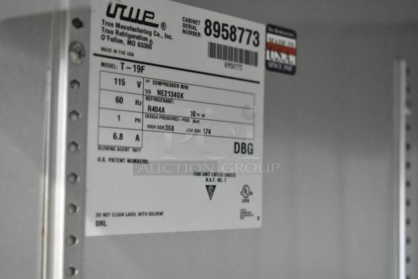 2016 True T-19F stainless steel freezer label detailing model, 115V, R404A refrigerant, commercial specs.