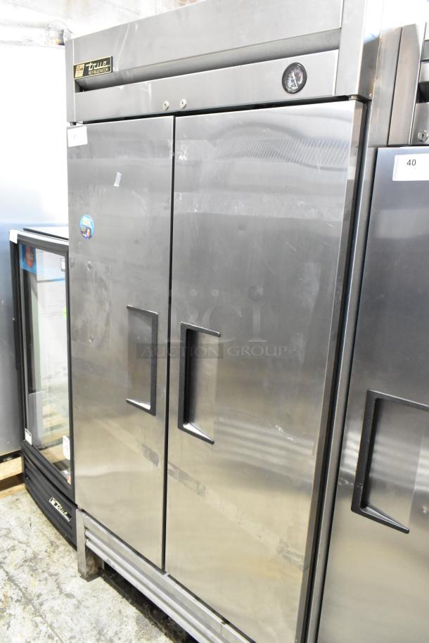 2016 True T-35 stainless steel commercial 2-door reach-in cooler with poly-coated racks. 115V, single phase power.