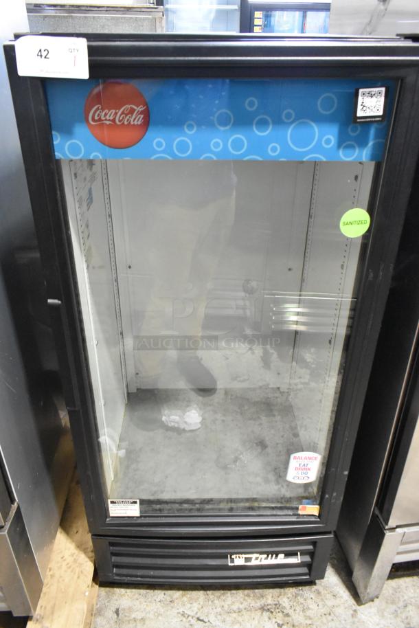 True GDM-10 commercial cooler merchandiser, single glass door, poly coated racks, 115 volts, sanitized sticker visible.