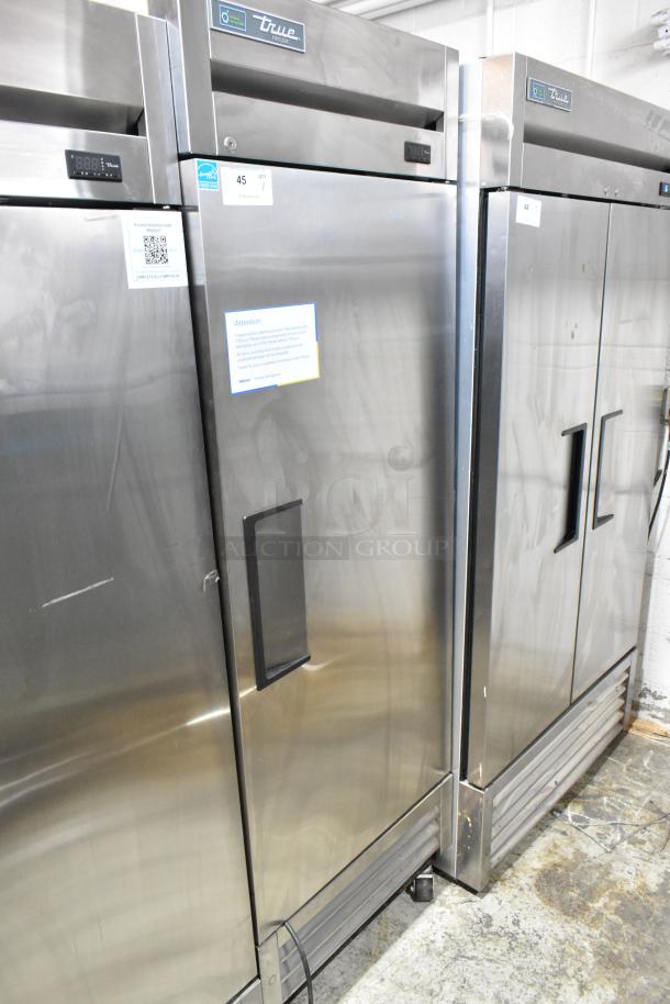 2022 True T-19F-HC stainless steel single door reach-in freezer, poly coated racks, 115V, excellent condition, visible labels.
