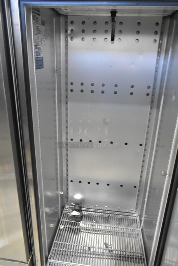 2023 True T-19F-HC stainless steel commercial freezer, single door, poly-coated racks, 115 volts, 1 phase.