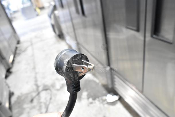 2023 True T-19F-HC stainless steel reach-in freezer, single door, with poly-coated racks. Plug shown, 115V, 1 phase.