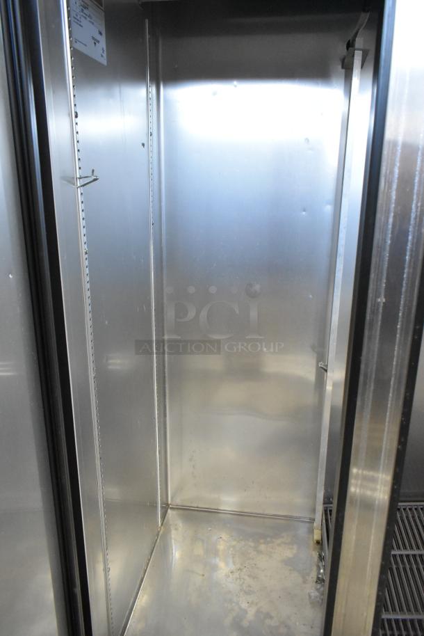2017 True T-35-HC stainless steel 2-door cooler interior, empty with poly-coated racks, 115V, 1 phase, commercial unit.