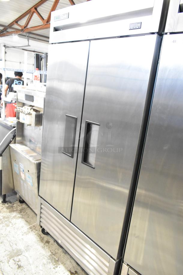 2018 True T-35-HC commercial reach-in cooler, stainless steel, two-door, poly-coated racks, 115V, 1 phase, excellent condition.