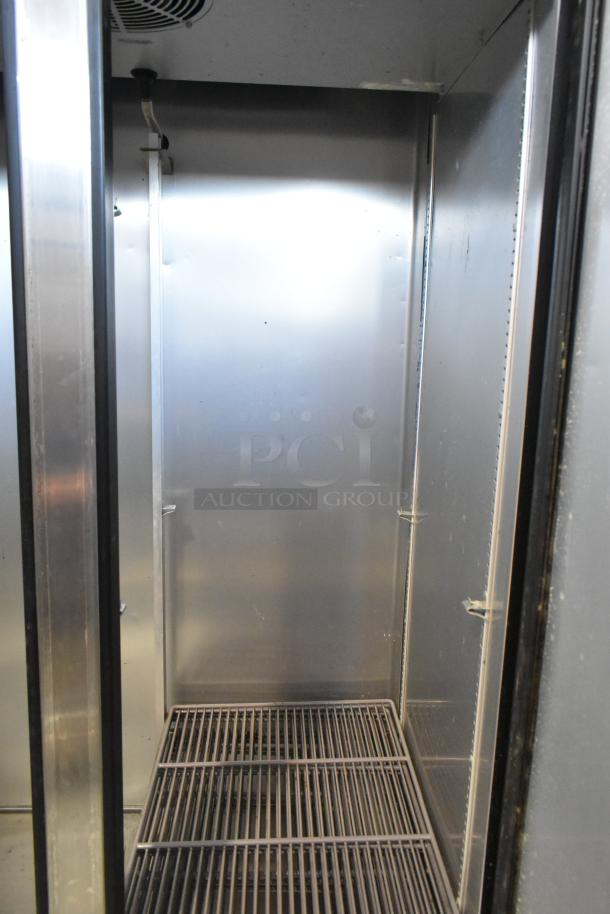 2018 True T-35-HC stainless steel commercial cooler interior with poly coated racks, 2 doors, 115 volts, 1 phase.