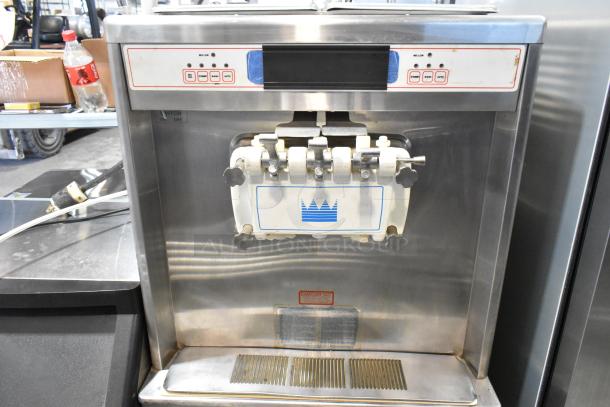 Taylor 754-33 stainless steel soft serve ice cream machine, 2 flavors with twist, on casters, 208/230V, 3 phase.