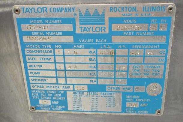 Taylor 754-33 Stainless Steel Soft Serve Ice Cream Machine label, 208/230V, 3-phase, shows model and specifications.