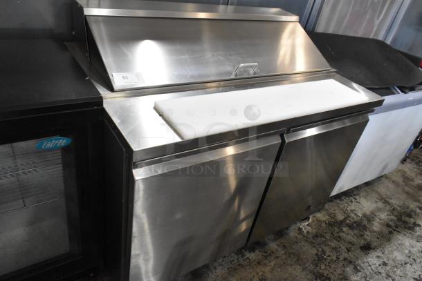 Entree S48 stainless steel prep table, bain marie mega top, 115 volts, 1 phase, double-door, cutting board, good condition.