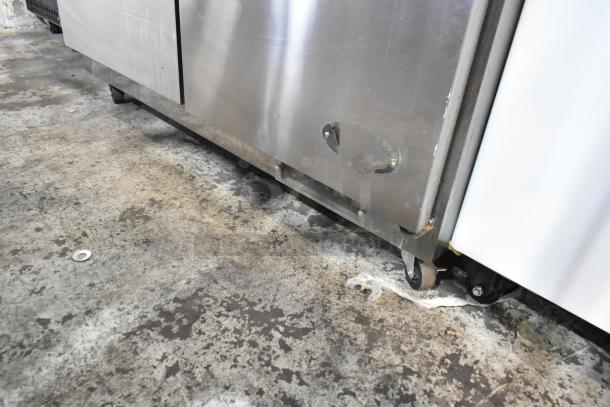 Entree S48 stainless steel commercial prep table, used condition, visible wear, on casters, 115 volts, 1 phase, model S48.