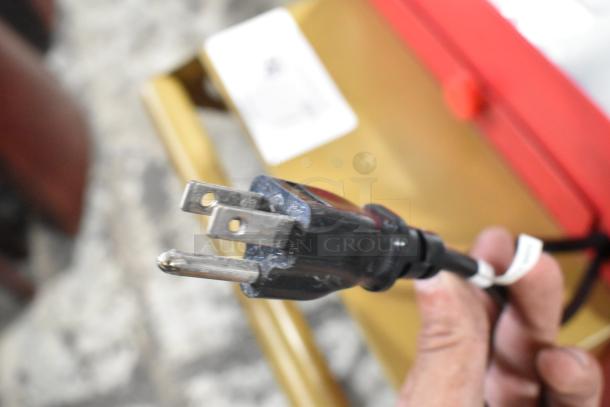 Close-up of a power plug for Nostalgia CCP510 Vintage Popcorn Cart, 120 volts, 1 phase. Plug in good condition.