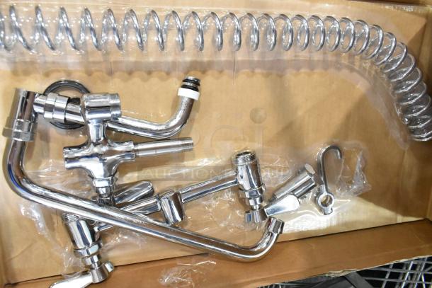 Brand new Regency 600PRD8X pre-rinse faucet, 1.15 GPM, deck-mounted, 8" centers, in original packaging, minor scratches.