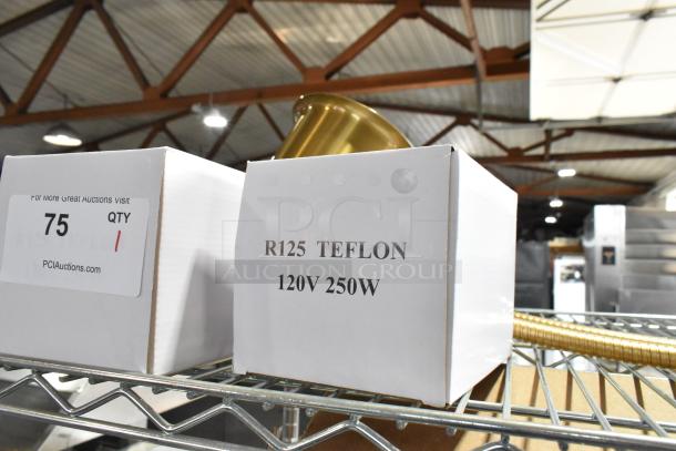 Box labeled "R125 Teflon 120V 250W" on shelf, indicating a brand new scratch and dent lightbulb. Auction tag: QTY 1.