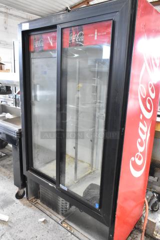 Imbera VRD37 commercial 2-door reach-in cooler with poly-coated racks. Features Coca-Cola signage. 115V, 1 phase.