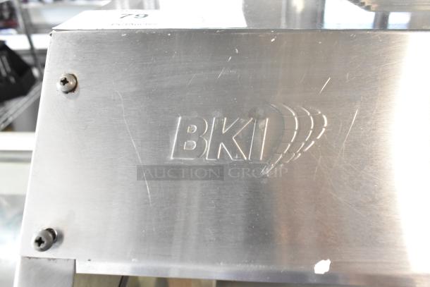 BKI Metal Commercial Buffet Station with logo, stainless finish, on casters, 125/208 volts, 1 phase, minor surface wear.
