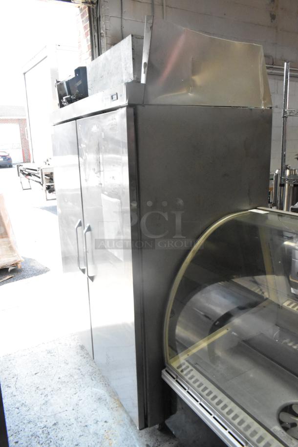 Hobart stainless steel 2-door commercial reach-in cooler, 115 volts, 1 phase, in good condition.