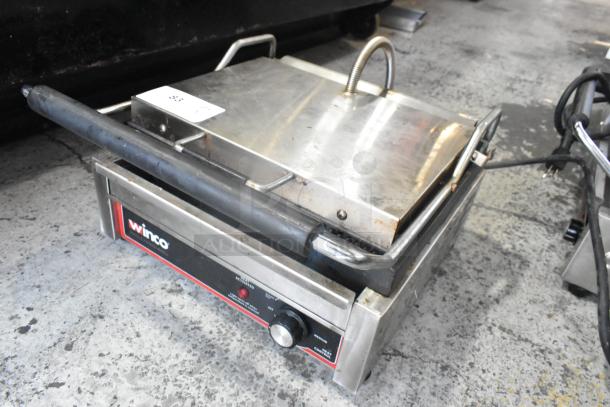 Winco EPG-1C stainless steel commercial countertop panini press, 120V, used condition, visible control knob and label.