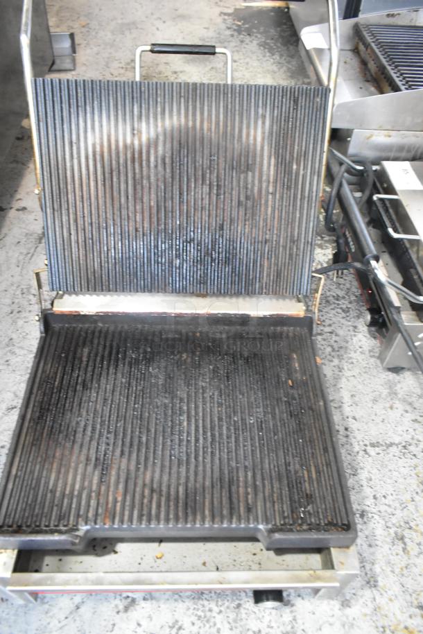 Winco EPG-1C Panini Press, stainless steel, commercial countertop, ribbed plates, 120V, used condition.