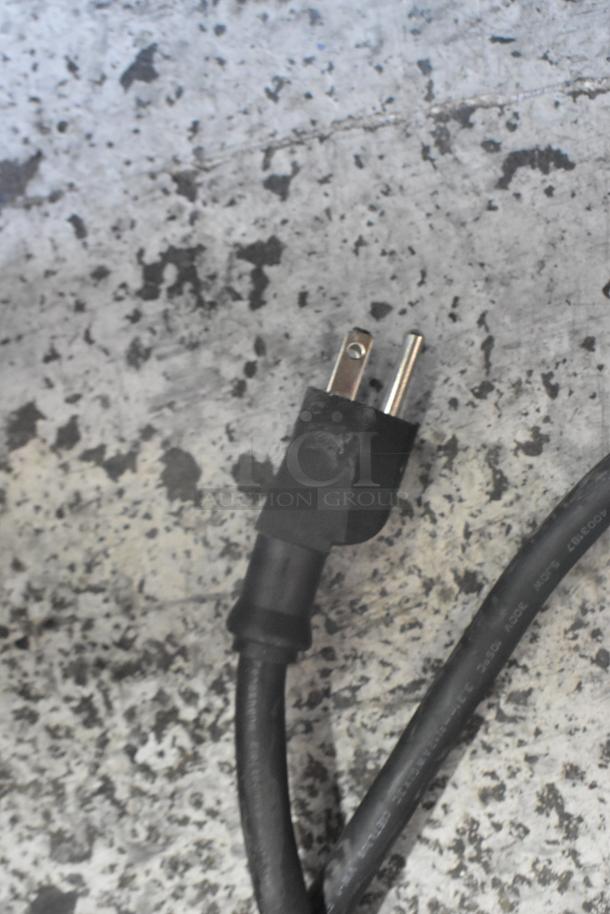 Power cord for Winco EPG-1C Stainless Steel Panini Press, 120 Volts, 1 Phase, shown on a speckled surface.