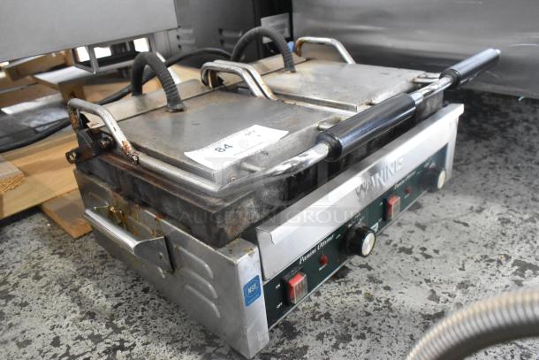 2020 Waring WPG300 double panini press. Stainless steel, well-used, countertop model. 240 volts, 1 phase, NSF certified.