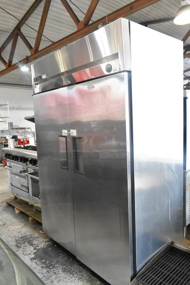True TM-52F stainless steel 2-door commercial freezer, 115V, 1 Phase, reach-in model. Clean exterior, visible brand logo.