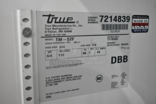 True TM-52F Commercial Freezer spec label; 115V, 1 Phase, Model TM-52F, Serial 7214839, uses R404A refrigerant.
