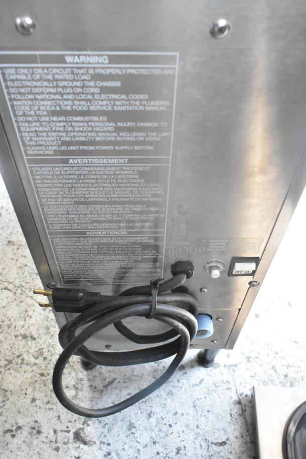 BRAND NEW Grindmaster RGNB-20H stainless steel grind and brew coffee machine, with hot water dispenser and metal brew basket.