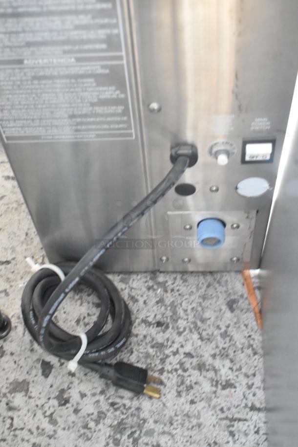 Grindmaster GNB-21H coffee machine back view with cord, stainless steel body, and control panel, 120V, 1 Phase.