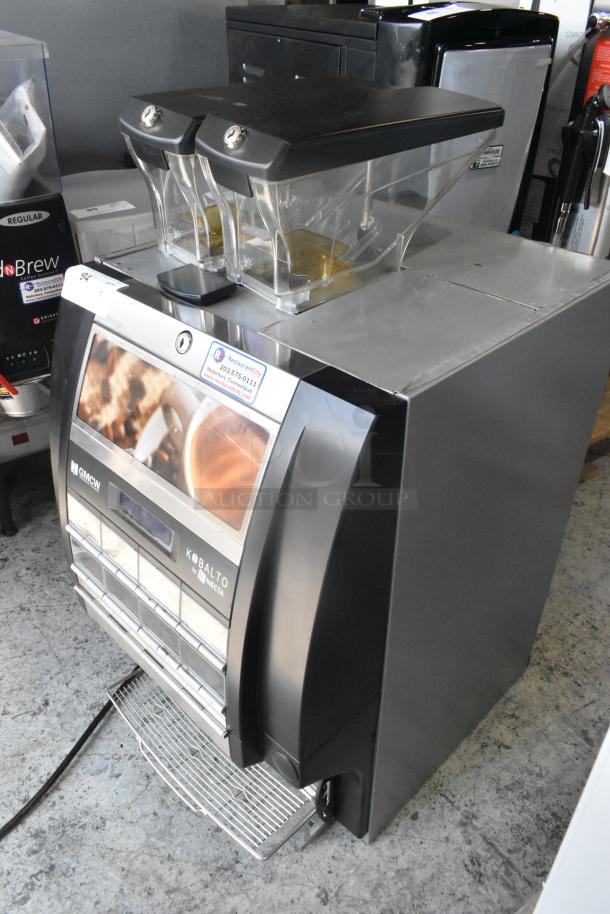 Necta Kolbalto metal commercial countertop automatic espresso machine, 208/250 volts, 1 phase, with dual hoppers, in good condition.