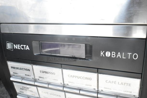Necta Kolbalto metal commercial countertop espresso/cappuccino machine. Features preselection and beverage labels. 208/250V, 1 phase.
