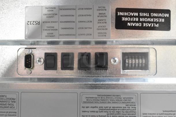 Necta Kolbalto commercial espresso machine control panel with switches and counter, showing model RS2332, in used condition.