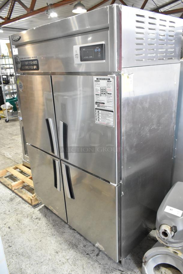 2023 Lassele LS-1045F stainless steel commercial freezer with four half-size doors, poly coated racks, on casters. Power cord cut.