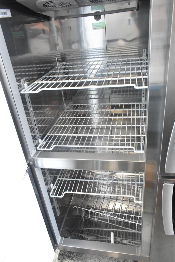 Lassele LS-1045F stainless steel commercial freezer with 4 half-size doors, poly-coated racks, and commercial casters. Power cord cut.