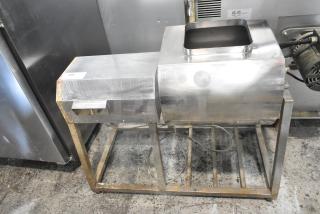 Metal commercial marinating station with steel frame, visible wear and oxidation. Auction tag "100" attached.