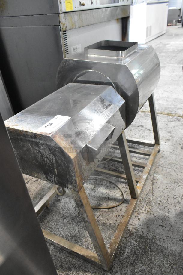 Metal commercial floor-style marinating station, angled drum, visible signs of wear, stainless steel frame, auction tag.