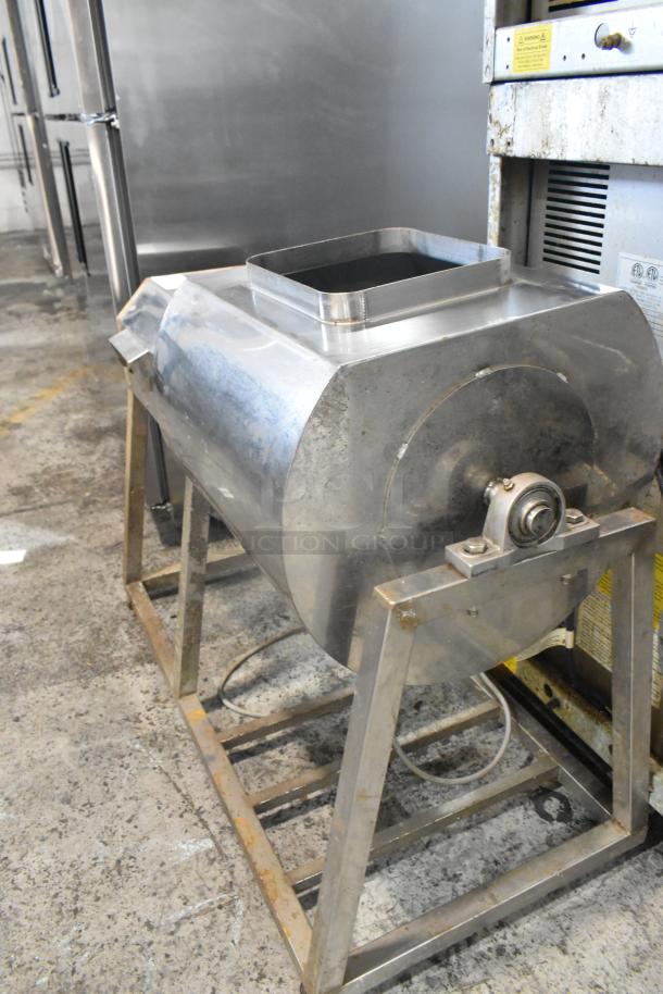 Metal commercial floor-style marinating station, stainless steel, used condition, visible frame, ideal for commercial kitchens.