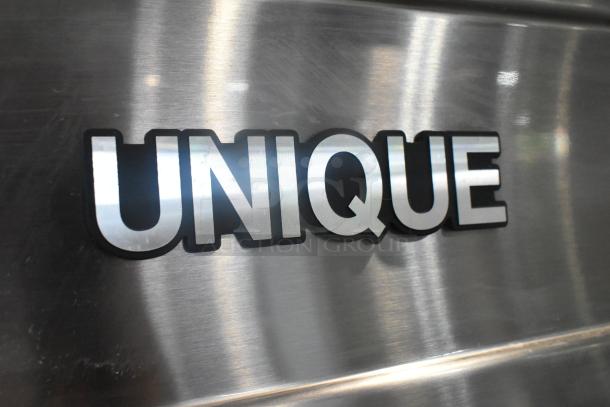 Unique stainless steel 4 half-size door cooler and freezer, on commercial casters. 115V, 1 phase. Make: Unique.