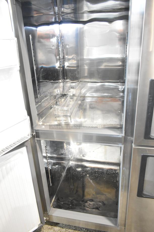 Unique Stainless Steel Commercial 4 Half Size Door Reach In Cooler and Freezer on Casters, 115V, 1 Phase. Clean interior.
