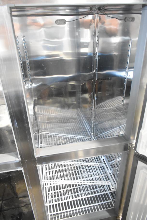 Unique stainless steel commercial 4 half size door reach-in cooler and freezer, on casters, 115 volts, 1 phase.