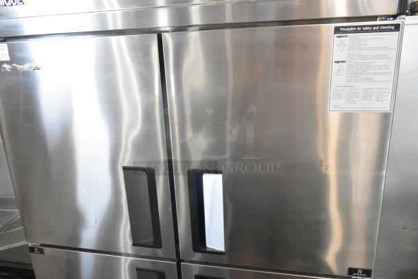 Unique stainless steel 4 half-size door reach-in cooler and freezer on commercial casters. 115V, 1 phase. Precaution label on door.