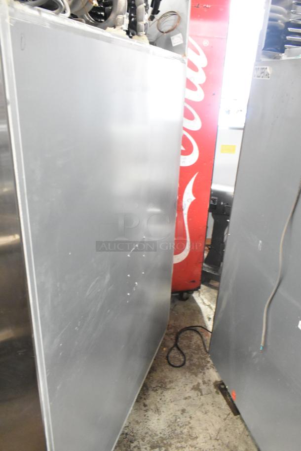Unique stainless steel commercial cooler and freezer with four half-size doors on casters. 115 volts, 1 phase.