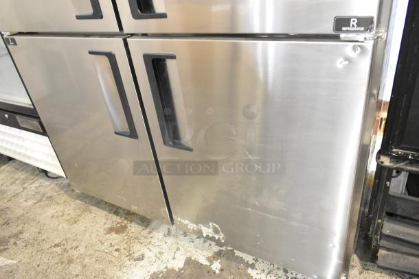 Unique stainless steel commercial cooler/freezer with four half-size doors, poly coated racks, and commercial casters.