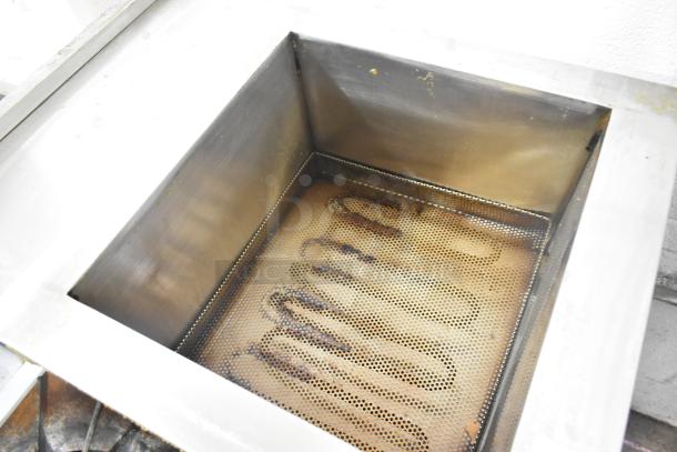 Selm SLT-05THS stainless steel single bay steam table, commercial use, visible heating element, perforated bottom, used condition.